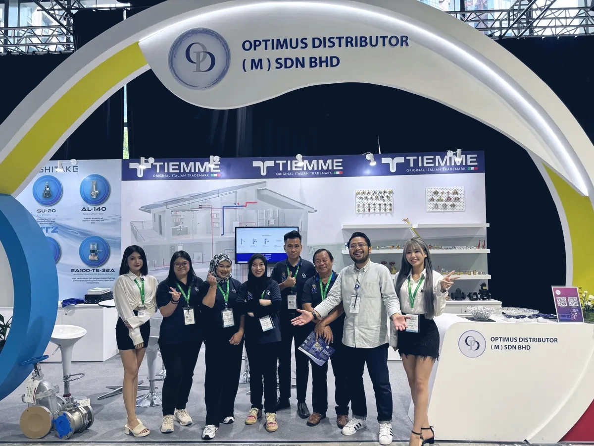 The Optimus team at their exhibition booth built with principal brand Tiemme