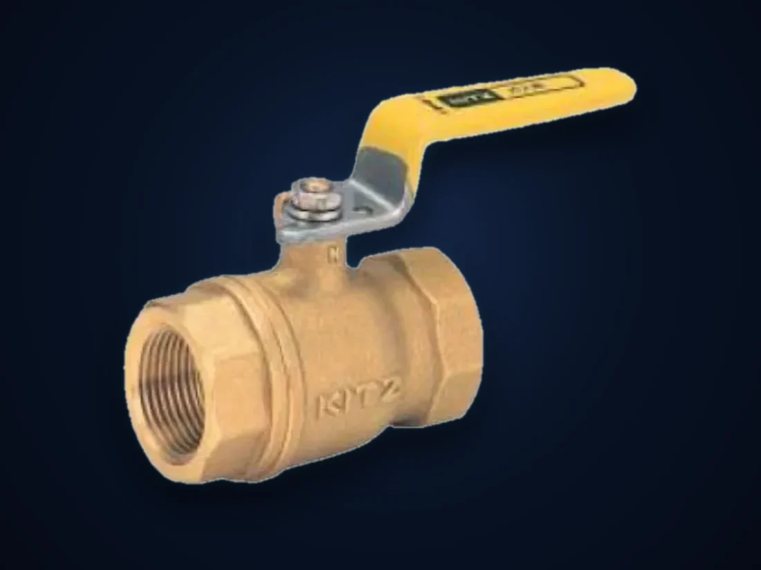 A small-bore brass ball valve with a yellow lever handle