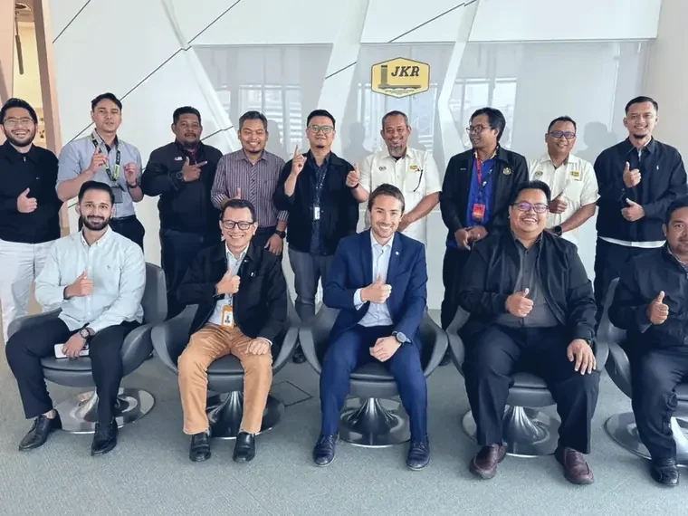Group photo from a technical exchange session with JKR engineers