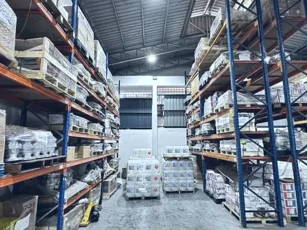 High racking aisle stocked with valve cartons